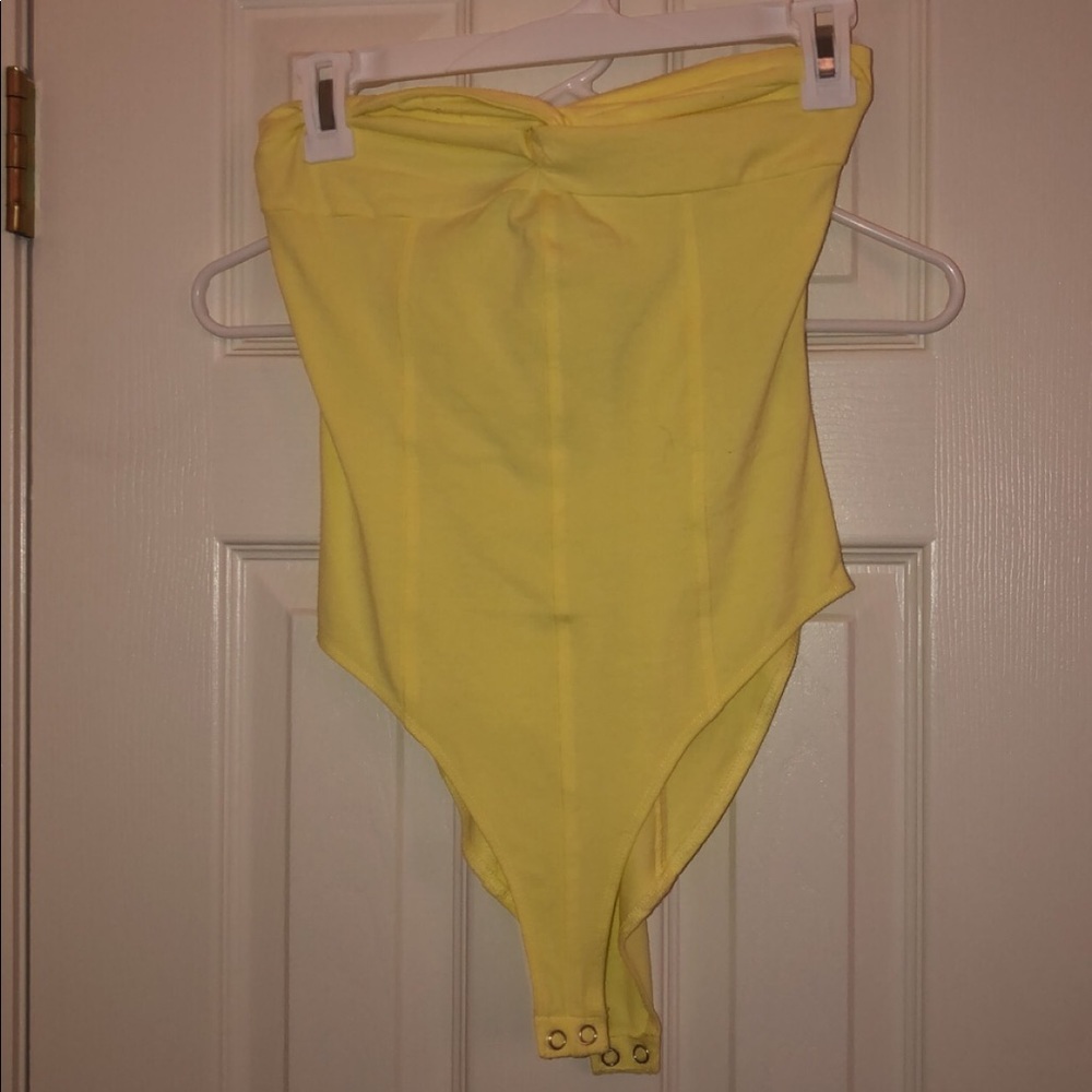 yellow bodysuit